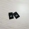 Etiquetas Digitales de Talla Universal en Stock al por Mayor, Etiquetas Numéricas Universales Plegables Adecuadas para Ropa y Productos Textiles para el Hogar
