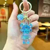 Figura de urso colorida de cristal transparente acrílico, uma peça de decoração de casa elegante, ornamento de mesa e acessório de chaveiro