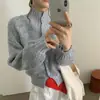 Cárdigan suéter de color contrastante estilo francés para mujer, nuevo modelo otoño e invierno 2026, cárdigan de punto holgado y casual para mujer