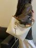 Envío Transfronterizo Bolsos de Nicho Estilo Coreano, Nuevos Bolsos de Hombro y de Mano de Primavera, Bolsos Cruzados Casuales Tipo Cubo, Bolsos Retro para Mujer para el Trabajo
