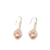 Pendientes de Lujo Accesible de Gama Alta Color Oro Champagne Perla Diseño de Nicho Retro Únicos Elegantes Nuevos Pendientes de Moda