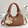 Bolso de mano tipo bolsa de dumplings nuevo y elegante de alta apariencia, bolso de hombro o axila versión coreana, bolso cruzado para mujer, bolso para mujer