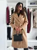 Europa e Estados Unidos transfronteiriço AliExpress outono e inverno popular feminino simples moda temperamento cor sólida lapela dupla cinto casaco de lã