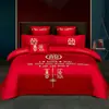 Juego de ropa de cama de lujo estilo chino, hecho de algodón 100% de fibra larga, un juego de cuatro piezas que incluye una sábana y una funda de edredón de algodón puro rojo, perfecto para la alcoba de una recién casada.