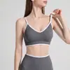 Sujetador deportivo transfronterizo de nuevo color block, sujetador de yoga absorbente de impactos, top de yoga para fitness al aire libre, camiseta sin mangas