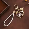 Presente de Dia dos Namorados chaveiro pingente coração de cristal pulseira de celular fofa decoração de bolsa coração acessório criativo