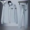 Conjunto de Moletom e Calça de Moletom de Cor Sólida Estampada Vendido Quente Europeu e Americano Conjunto de Duas Peças Novo Primavera e Outono Roupa Esportiva Casual para Casais