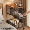 Alternativa pequeña y sencilla de mesita de noche, adecuada para dormitorios del hogar, un estante de almacenamiento móvil junto a la cama y un gabinete de noche con cajones