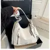 Mochila de un solo hombro y doble hombro para mujer, nuevo modelo otoño 2026, bolsa de axila popular para el día a día, mochila para estudiantes universitarios, bolsa tote