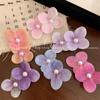 Pinza para el pelo de doble flor de perla de verano dulce y fresca, accesorio para el pelo de patito de goma con ambiente playero y femenino, tocado