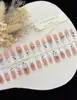 Uñas negras KT medianas ponibles Kitty, suaves y lindas, iluminan el tono de piel, deseo puro femenino, puntas de uñas con diamantes ruborizados fábrica
