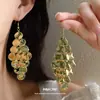 Pendientes de Gancho Europeos y Americanos Transfronterizos con Hojas Irregulares Caladas y Borlas, Pendientes Elegantes y de Gama Alta, Accesorios de Oreja Minimalistas de Nicho al por Mayor