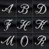Temperamento de comercio exterior europeo y americano 26 broches de letras inglesas femenina diamante personalidad Joker moda corsage pin masculino accesorios