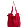 Bolsa de tecido grande capacidade estilo faculdade para mulheres, nova moda primavera-verão 2026, bolsa de ombro leve, simples, versátil, tote bag