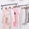 Loja de Roupas Femininas Espessada Prateleira de Exposição de Roupas Montada na Parede Haste de Pendurar Roupas Infantis de Aço Inoxidável Cabide de Roupas Pendurado Lateral Celebridade da Internet