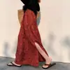Impresionante y hermoso falda midi roja estampada de talle alto con abertura para vacaciones en la playa para mujer verano 2026
