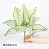 Plantas artificiales de estilo nórdico, flores falsas y decoraciones de follaje, incluyendo un pequeño juego de nueve calas artificiales y hojas de monstera, para separadores de ambientes interiores y paisajismo