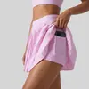 Directo de Fábrica Nueva Falda Corta Anti-exposición Bloque de Color Cintura Alta Bolsillo Fitness Running Deportiva Plisada para Mujer Venta al por Mayor
