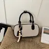 Bolso de mano para mujer transfronterizo, nuevo estilo coreano, bolso cuadrado pequeño de alta gama, diseño sofisticado y minimalista, adecuado para ir al trabajo, bolso cruzado, bolso de hombro, moderno