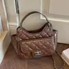 Bolso de cadena casual de moda transfronterizo con patrón de rombos nuevo 2026 retro de alta apariencia para el trabajo bolso de nicho de un solo hombro cruzado