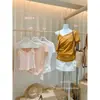 Liquidación sin devoluciones ni cambios Conjunto de dos piezas estilo coreano suave de verano: top tipo camisola de encaje + camiseta pequeña de un hombro 28127