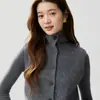 Artefacto para capas~Chaleco de cachemir de cuello alto abotonado de otoño e invierno para mujer, camisola de punto grueso sin mangas como capa base