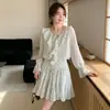 Vestido blanco de estilo francés para verano con mangas acampanadas de lunares, cuello en V con cordones y falda corta de línea A con volantes plisados, elegante, para primavera y verano