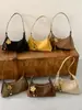 Moderna colección 2026 de bolsos de nicho para mujer: bolsos de hombro, bolsos de axila y bolsos cruzados de moda y minimalistas para el uso diario y para ir al trabajo.
