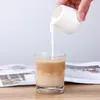 Taza pequeña de leche cerámica con asa grande tamaño pequeño cuchara para leche cuchara para salsa taza de leche cuchara para leche condensada azucarero jarra de leche cubo para jugo de filete