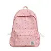 Mochila fresca y sencilla de lunares con lazo para mujer, nuevo modelo 2026, mochila versátil de gran capacidad para estudiantes de secundaria y preparatoria