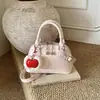 Bolso Único de Lunares 2026 Primavera Nuevo Elegante Bolso Concha Moderno Cruzado Bolso para Labiales para Salir