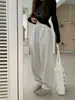 Pantalones largos de mezcla de algodón estilo americano para primavera y otoño, pantalones deportivos casuales anchos y holgados para mujer, de corte recto con una ligera caída y un sutil dobladillo curvo