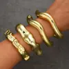 Accesorio transfronterizo de gran venta, producto nuevo: brazalete abierto de forma de ola irregular para mujer, conjunto de tres piezas personalizado y de moda de joyería para mujer