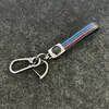 Llavero de metal para coche transfronterizo con banda de color llavero llavero cordón para llave de coche anti-pérdida al por mayor