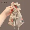 Estilo Coreano Moda Ins Nuevo Cinta Floral Perla Lazo para Cola de Caballo Temperamento Suave Cuerda para el Cabello Versátil Accesorio para el Cabello 2026