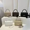 Moda de viajero estilo coreano cubierta texturizada única nueva 2026 color sólido casual simple bolso cruzado pequeño cuadrado