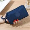 18 bolso de mano caliente coreano casual lona bolsa para teléfono móvil tres capas mujer mamá muñequera bolso de mano outlet de fábrica