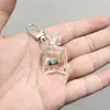 SHEIN TEMU Chaveiro Explosivo Peixe Dourado Transparente Peixinho Chaveiro de Resina Pingente de Joia Acessórios