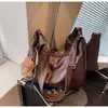 Bolso bandolera de alta gama a la moda con textura de cuero suave para mujer, gran capacidad, nuevo estilo 2026, bolso de hombro casual versátil para el día a día