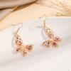 Europa y Estados Unidos transfronterizo nueva moda forma de mariposa aretes de flor seca aretes joyería