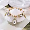 2025 Panjia Nuevo Más Vendido Elegante Flor Blanca de Diamante Cuadrado Colgante de Circonita Pulsera de Cuentas DIY Venta al por Mayor