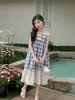 Vestido Chaleco a Cuadros Retro para Niñas Falda de Encaje Estilo Verano 2026 Estilo Vacaciones Vestido Delgado con Tirantes Franceses