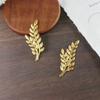 Acessórios DIY antigos Hanfu acessórios para cocar de noiva acessórios para roupas metal folhas ocas peças de flores atacado