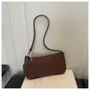 Bolsa de Ombro Retro Simples Feminina 2026 Nova Bolsa de Mão Jeans com Corrente de Alta Qualidade Versátil