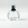 Botella de perfume de lujo de 50 ml directa de fábrica, botella de vidrio transparente facetado para dispensar perfume y aceite esencial, venta al por mayor