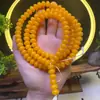 Fornecimento de fábrica verde vegetação tingido amarelo cera de abelha raiz de bodhi pulseira de 108 contas contas soltas acessórios joias DIY atacado