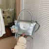 Bolsa de Mão da Moda Transfronteiriça Pequena Bolsa Feminina Outono 2026 Nova Exquisite Bolsa Transversal Casual Versátil para o Dia a Dia Bolsa de Ombro Único