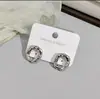 Pendientes pequeños con textura de metal, diseño de nicho europeo y americano, sencillos, modernos y combinables, de alta calidad y con un toque frío.