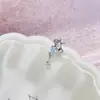 Pendientes de Hélice para Hélice de Oreja de Mujer con Colgante de Estrella Hueca Linda, Gota de Agua Azul Circonita, Pendientes Ligeros de Lujo de Gama Alta para Mujer, Versátiles