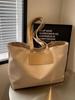 Bolsa Tote Casual Simples para Mulheres 2026 Nova Versátil de Grande Capacidade Bolsa para o Dia a Dia Moda de Nicho Bolsa de Ombro